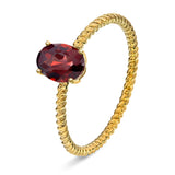 Ring i Gult Gull (585), 0.90ct Oval Granat