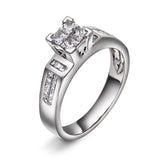 Diamantring i Hvitt Gull, 0.70ct TW/SI Diamanter