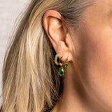 Janne Formoe Pan Jewelry – Øreringer i sølv med grønn zirkonia