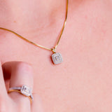 Halssmykke i Hvitt/Gult Gull (585) med 0.13ct TW/SI Diamanter